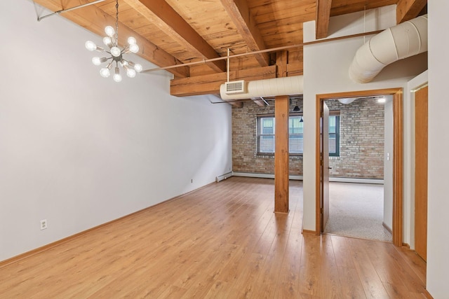 400 1st St Unit 502, Minneapolis, MN 55401 - basement featuring wooden ceiling, brick wall, wood-type flooring, a chandelier, and baseboard heating