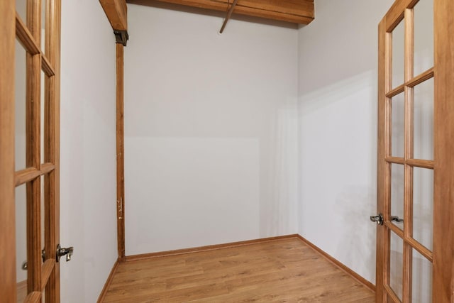 400 1st St Unit 502, Minneapolis, MN 55401 - spacious closet featuring french doors and light wood finished floors