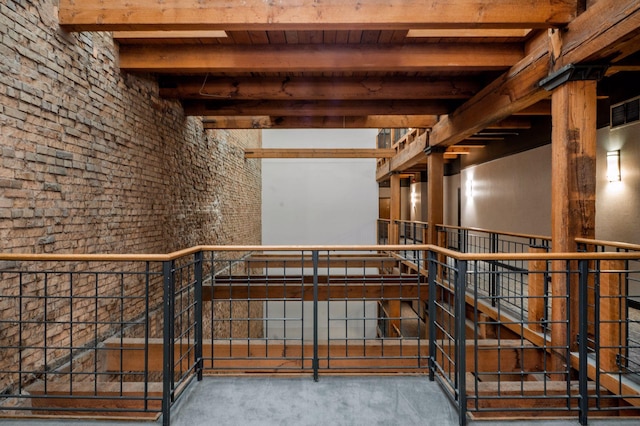 400 1st St Unit 502, Minneapolis, MN 55401 - stairway with a wood ceiling with exposed beams and concrete floors