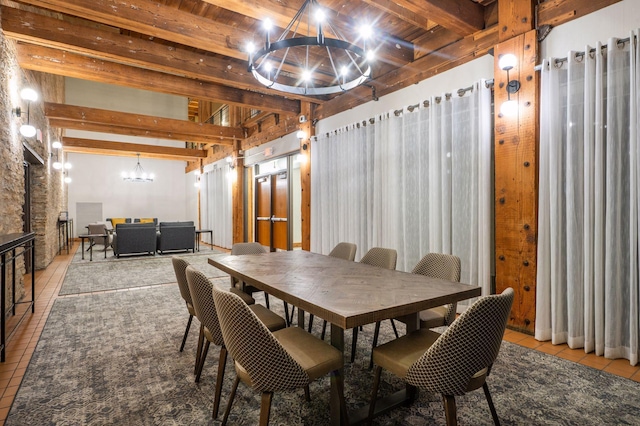 400 1st St Unit 502, Minneapolis, MN 55401 - dining room featuring a chandelier, tile patterned flooring, beamed ceiling, and a fireplace