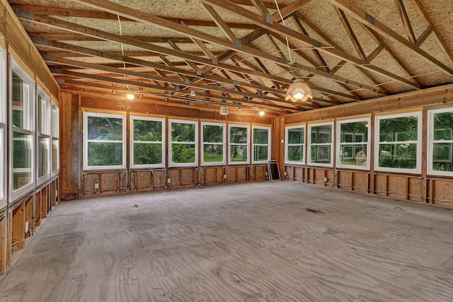 906 Holcombe Ave, Litchfield, MN 55355 - unfurnished sunroom featuring lofted ceiling
