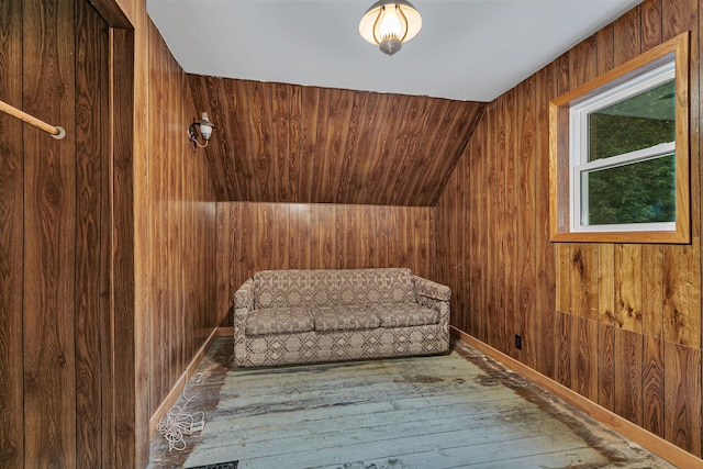 906 Holcombe Ave, Litchfield, MN 55355 - sitting room with wood walls and wood-type flooring