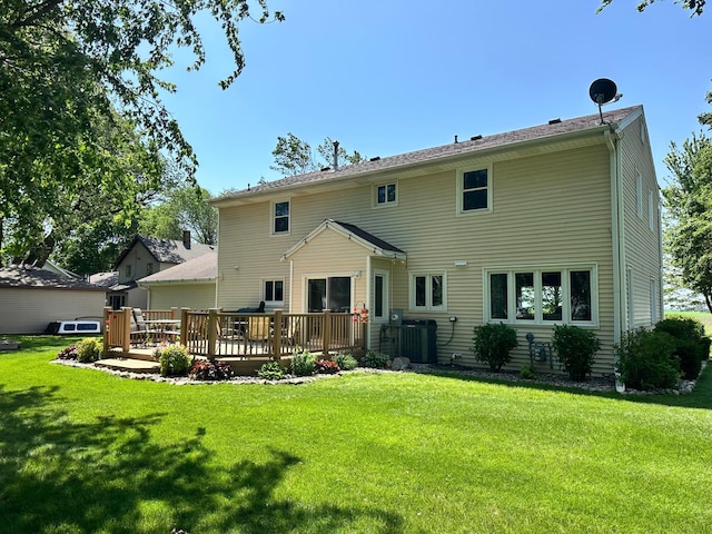 515 2nd St SW, New Richland, MN 56072 - back of property featuring a wooden deck and a yard