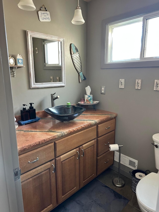515 2nd St SW, New Richland, MN 56072 - bathroom featuring healthy amount of natural light and vanity
