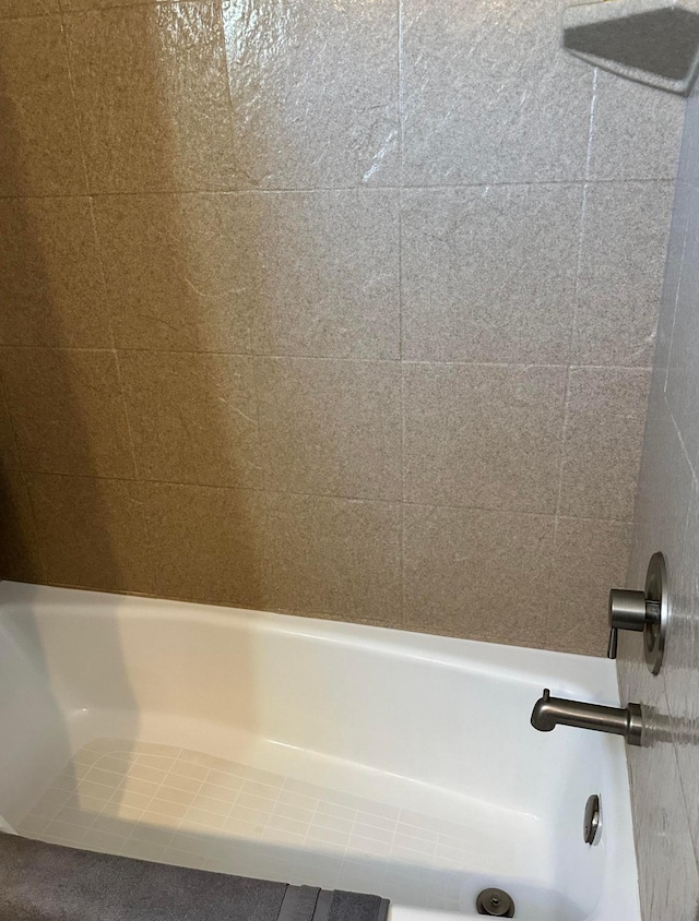 515 2nd St SW, New Richland, MN 56072 - bathroom featuring a bath and a shower