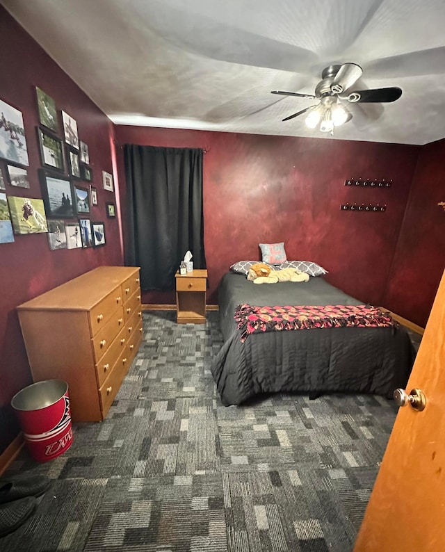 515 2nd St SW, New Richland, MN 56072 - carpeted bedroom featuring ceiling fan and baseboards