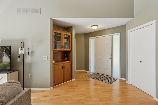 7140 Ivy Ridge Ct, Lino Lakes, MN 55014 - foyer with light wood-type flooring and baseboards