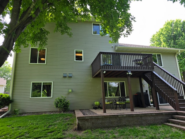 100 Barkley Cir W, Cannon Falls, MN 55009 - rear view of house with stairway, a deck, and a patio