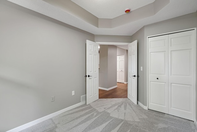 645 1st St Unit 305, Minneapolis, MN 55401 - unfurnished bedroom featuring carpet flooring and a closet