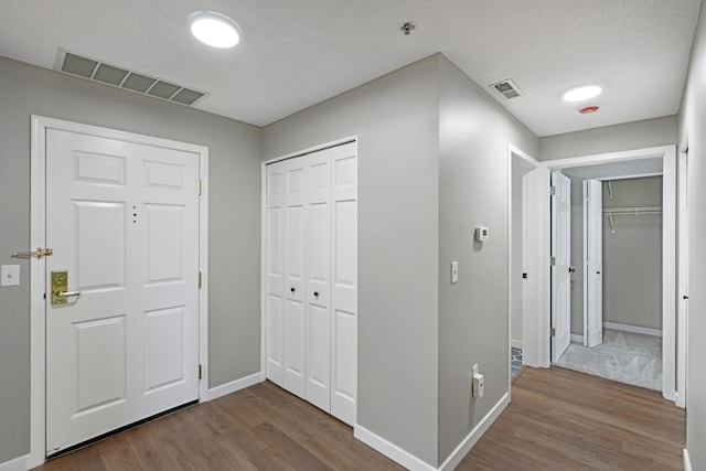 645 1st St Unit 305, Minneapolis, MN 55401 - corridor featuring wood finished floors and baseboards