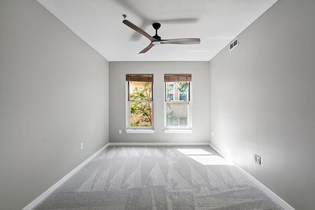 645 1st St Unit 305, Minneapolis, MN 55401 - empty room with carpet floors, ceiling fan, and a textured ceiling