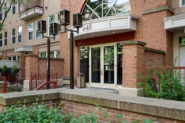 645 1st St Unit 305, Minneapolis, MN 55401 - property entrance with french doors and brick siding