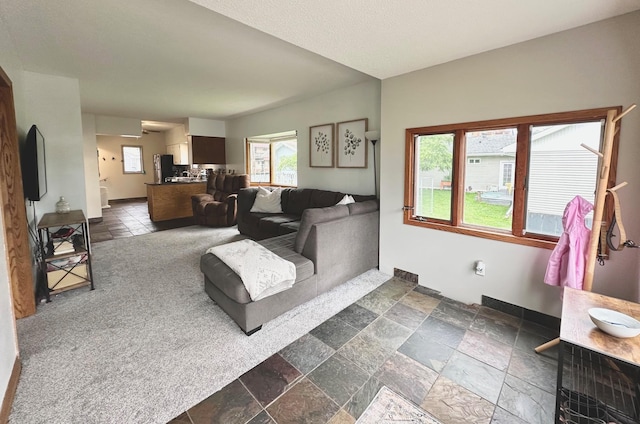 511 3rd St, Nashwauk, MN 55769 - living area with stone tile floors