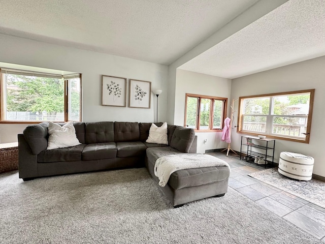 511 3rd St, Nashwauk, MN 55769 - living area with a textured ceiling and baseboards
