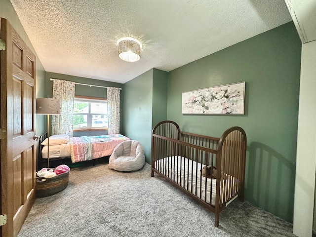 511 3rd St, Nashwauk, MN 55769 - carpeted bedroom with a textured ceiling