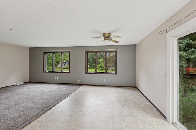 812 Ivanhoe Dr, Northfield, MN 55057 - unfurnished room with a ceiling fan and baseboards