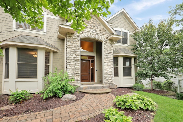 7569 Blackoaks Ln N, Maple Grove, MN 55311 - property entrance featuring stone siding
