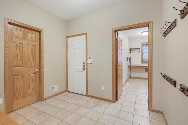 7569 Blackoaks Ln N, Maple Grove, MN 55311 - foyer featuring light tile patterned floors and baseboards