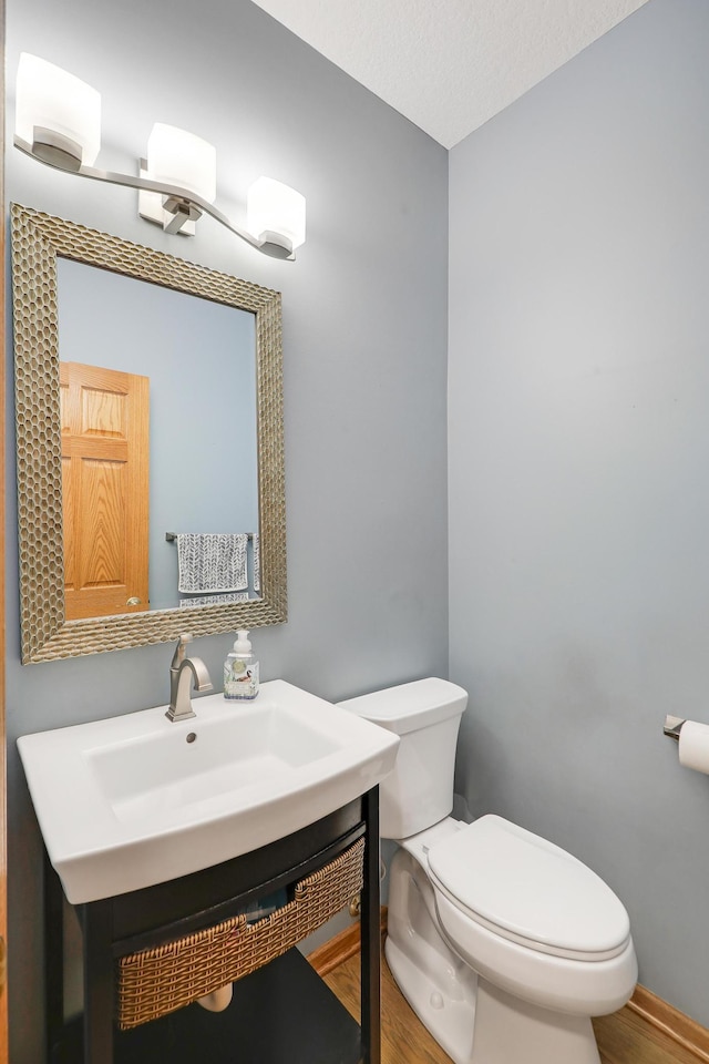7569 Blackoaks Ln N, Maple Grove, MN 55311 - bathroom with wood finished floors and vanity