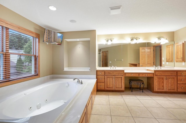 7569 Blackoaks Ln N, Maple Grove, MN 55311 - full bath with double vanity, a jetted tub, and tile patterned flooring