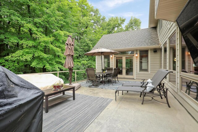 7569 Blackoaks Ln N, Maple Grove, MN 55311 - wooden deck with french doors and outdoor dining space