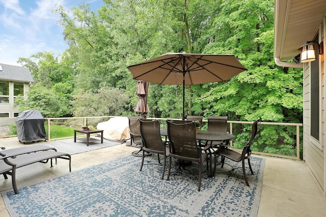 7569 Blackoaks Ln N, Maple Grove, MN 55311 - view of patio featuring outdoor dining area and a grill