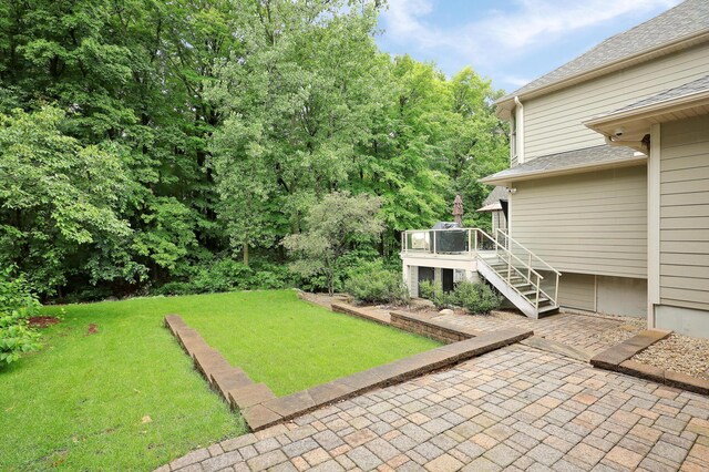 7569 Blackoaks Ln N, Maple Grove, MN 55311 - view of green lawn featuring stairs, a deck, and a patio