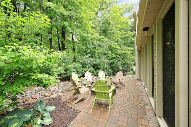7569 Blackoaks Ln N, Maple Grove, MN 55311 - view of patio with a fire pit