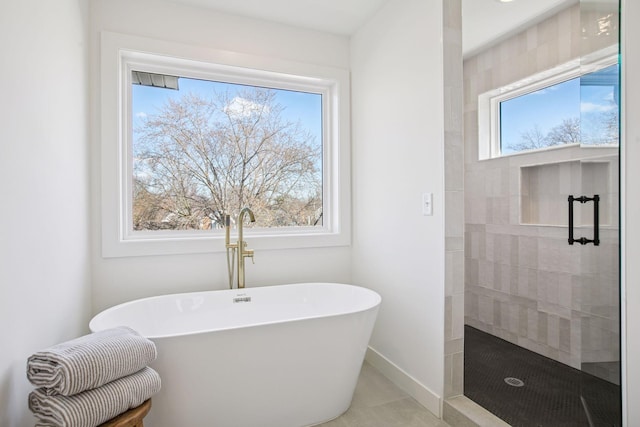 3520 27th Ave S, Minneapolis, MN 55406 - bathroom featuring a soaking tub and a tile shower