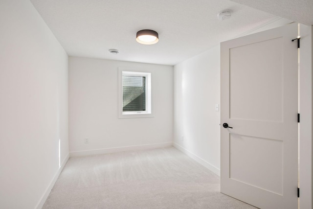3520 27th Ave S, Minneapolis, MN 55406 - unfurnished room featuring a smoke detector and light colored carpet