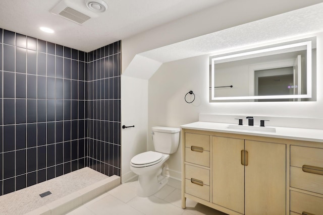 3520 27th Ave S, Minneapolis, MN 55406 - full bathroom featuring vanity, tiled shower, and tile patterned floors