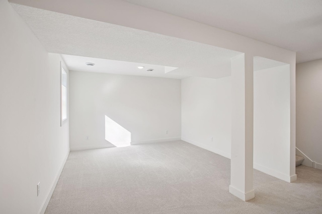 3520 27th Ave S, Minneapolis, MN 55406 - basement featuring light carpet, stairs, and recessed lighting