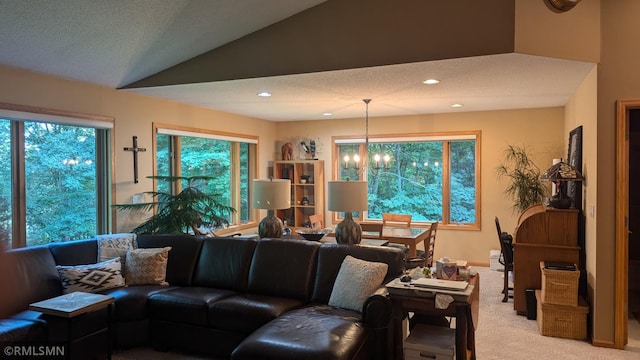 21021 Fresno St NW, Elk River, MN 55330 - living room with light colored carpet, recessed lighting, and lofted ceiling