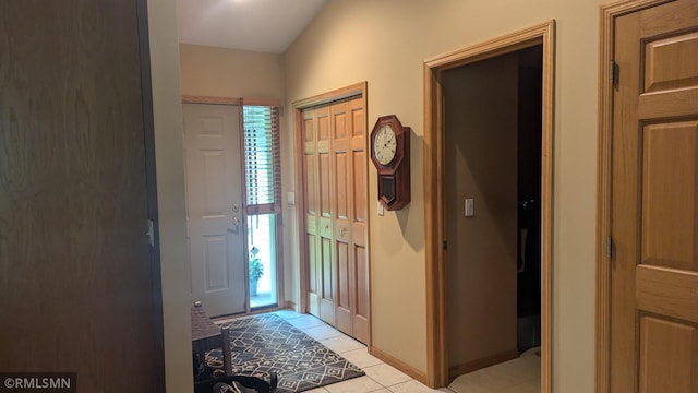 21021 Fresno St NW, Elk River, MN 55330 - entrance foyer featuring light tile patterned flooring and baseboards