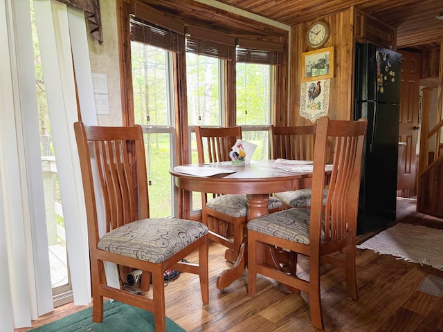 29156 State Highway 47, Aitkin, MN 56431 - dining area featuring healthy amount of natural light, wooden ceiling, and wood finished floors