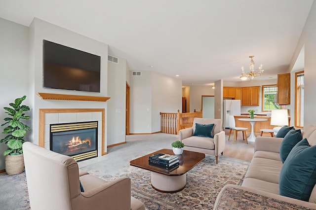 13501 96th Pl N, Maple Grove, MN 55369 - living area featuring a chandelier and a fireplace