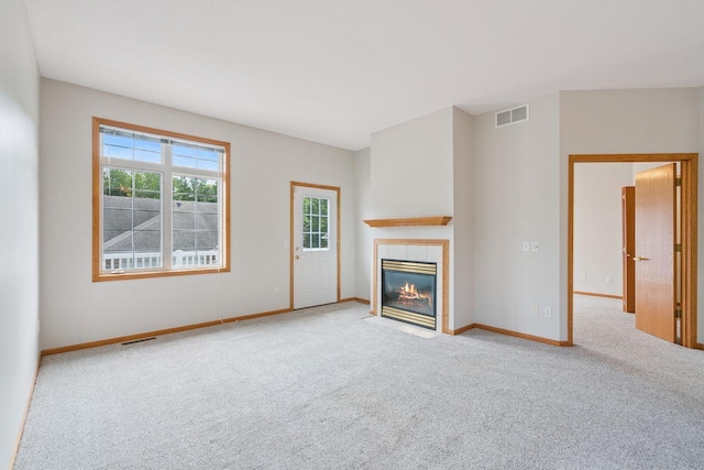 13501 96th Pl N, Maple Grove, MN 55369 - unfurnished living room featuring carpet and a fireplace