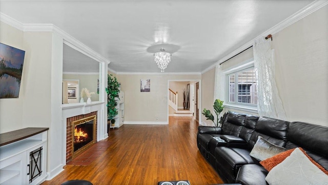 918 Trott Ave SW, Willmar, MN 56201 - living area featuring stairs, wood finished floors, a fireplace, crown molding, and a chandelier