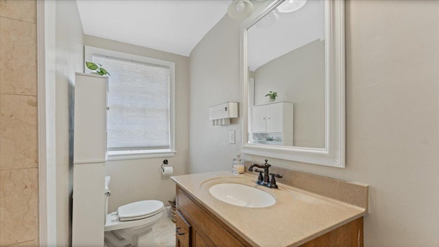 918 Trott Ave SW, Willmar, MN 56201 - bathroom featuring vanity and vaulted ceiling