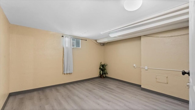 918 Trott Ave SW, Willmar, MN 56201 - spare room with wood finished floors and baseboards