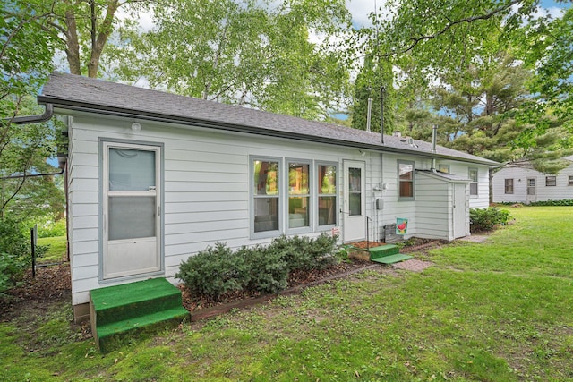 1671 Little Butternut Lake Ln, Luck, WI 54853 - view of front facade featuring entry steps and a front lawn