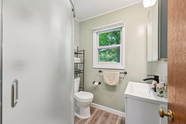 1671 Little Butternut Lake Ln, Luck, WI 54853 - bathroom with vanity, crown molding, and wood finished floors