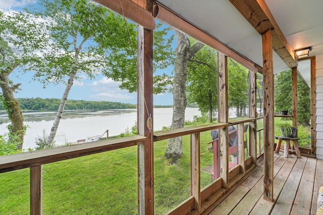 1671 Little Butternut Lake Ln, Luck, WI 54853 - wooden deck featuring a water view and a lawn