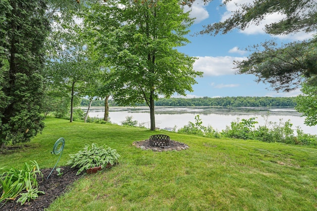 1671 Little Butternut Lake Ln, Luck, WI 54853 - view of green lawn with a water view and a fire pit