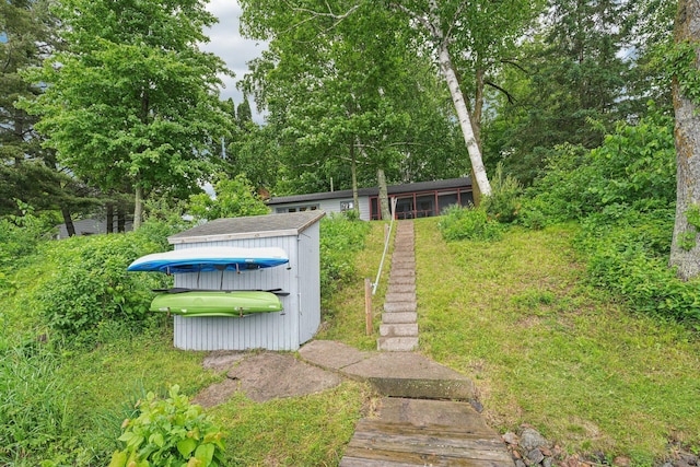 1671 Little Butternut Lake Ln, Luck, WI 54853 - view of yard with a storage unit