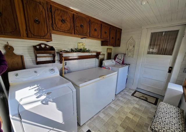 2047 60th Ave, Altona Twp, MN 56164 - laundry room with washing machine and dryer, wood ceiling, and wood walls