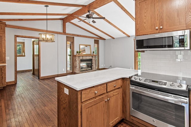 6230 Elm Ridge Cir, Corcoran, MN 55340 - kitchen featuring appliances with stainless steel finishes, open floor plan, tasteful backsplash, a peninsula, and ceiling fan