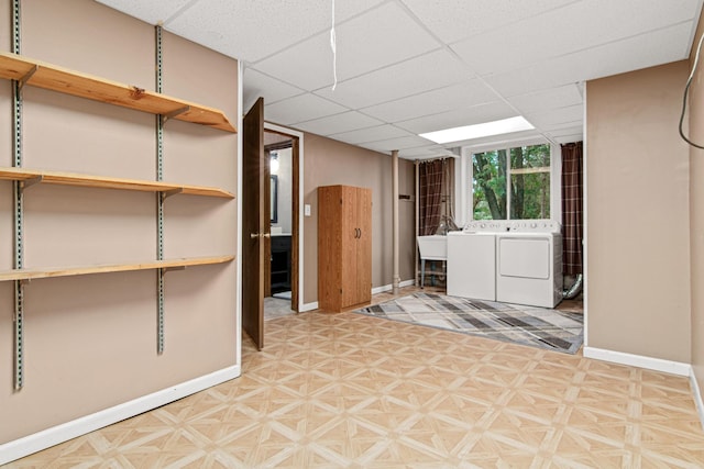 6230 Elm Ridge Cir, Corcoran, MN 55340 - basement featuring tile patterned floors, independent washer and dryer, and a drop ceiling