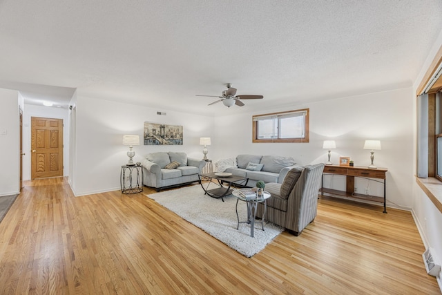 3916 Thomas Ave S, Minneapolis, MN 55410 - living room with a ceiling fan and light wood-style floors