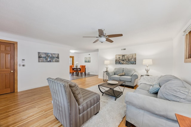 3916 Thomas Ave S, Minneapolis, MN 55410 - living area featuring light wood-style floors and a ceiling fan